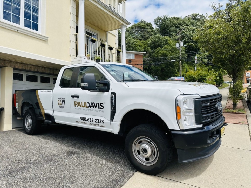 water damage restoration after a burst water heater in Avenel